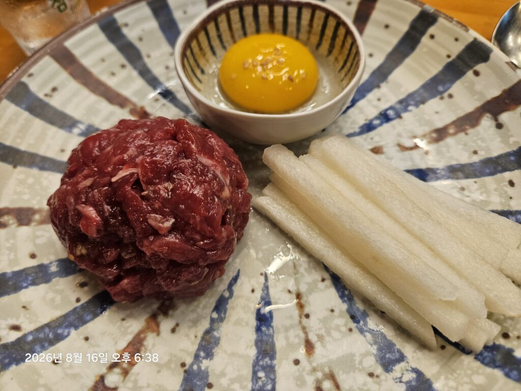Korean yukhoe raw beef with Asian pear and egg yolk