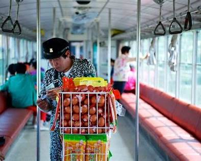 Food cart selling snacks on a Korean train
